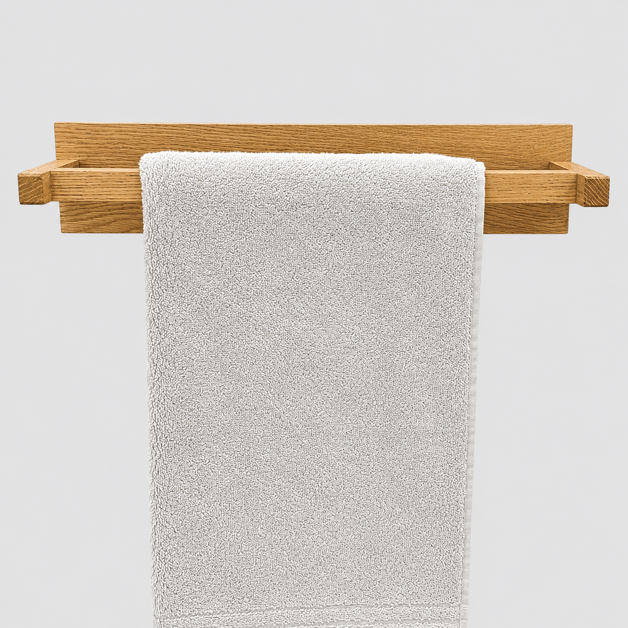 Bathroom towel rail, wall mounted in solid oak