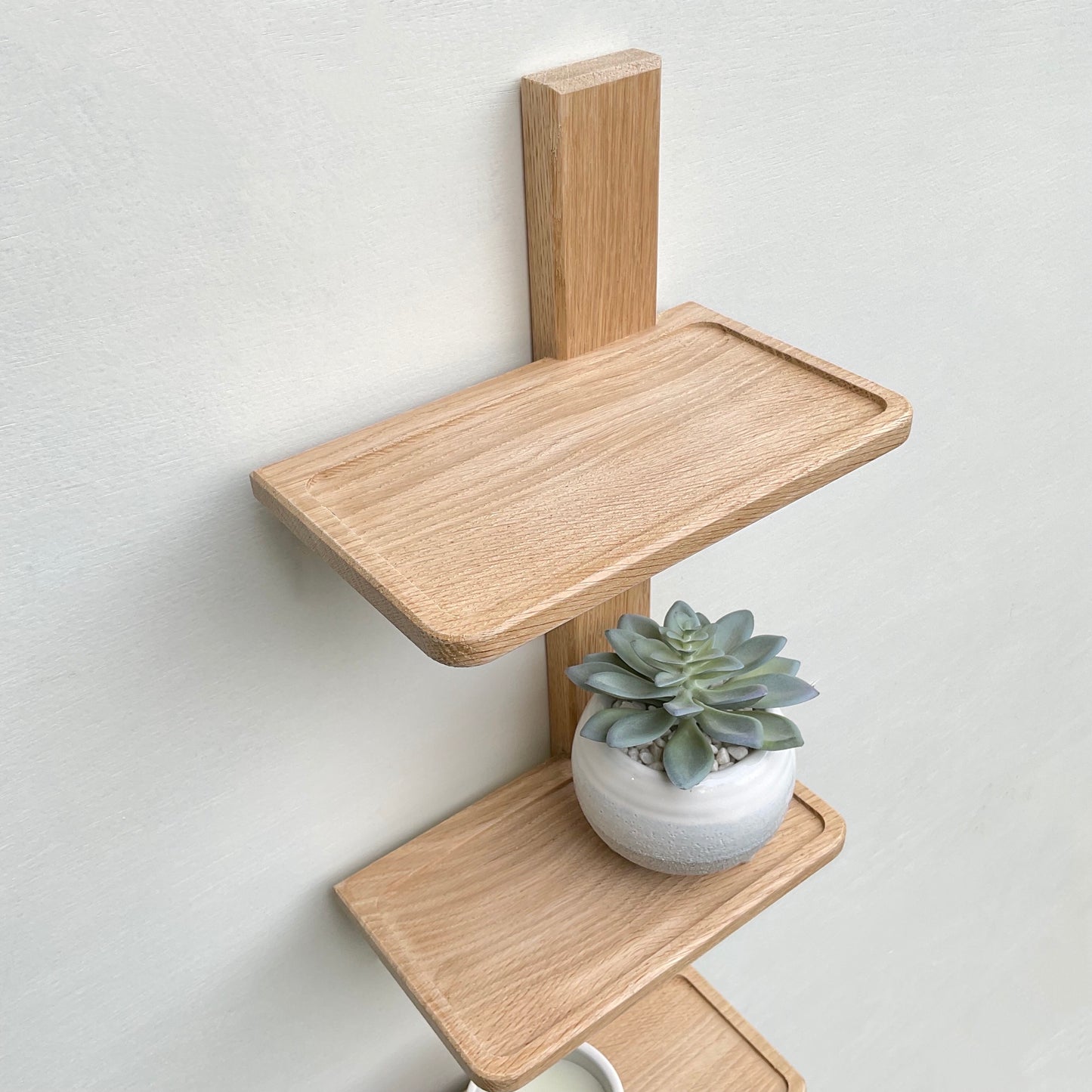 Vertical oak bathroom or cloakroom shelf unit