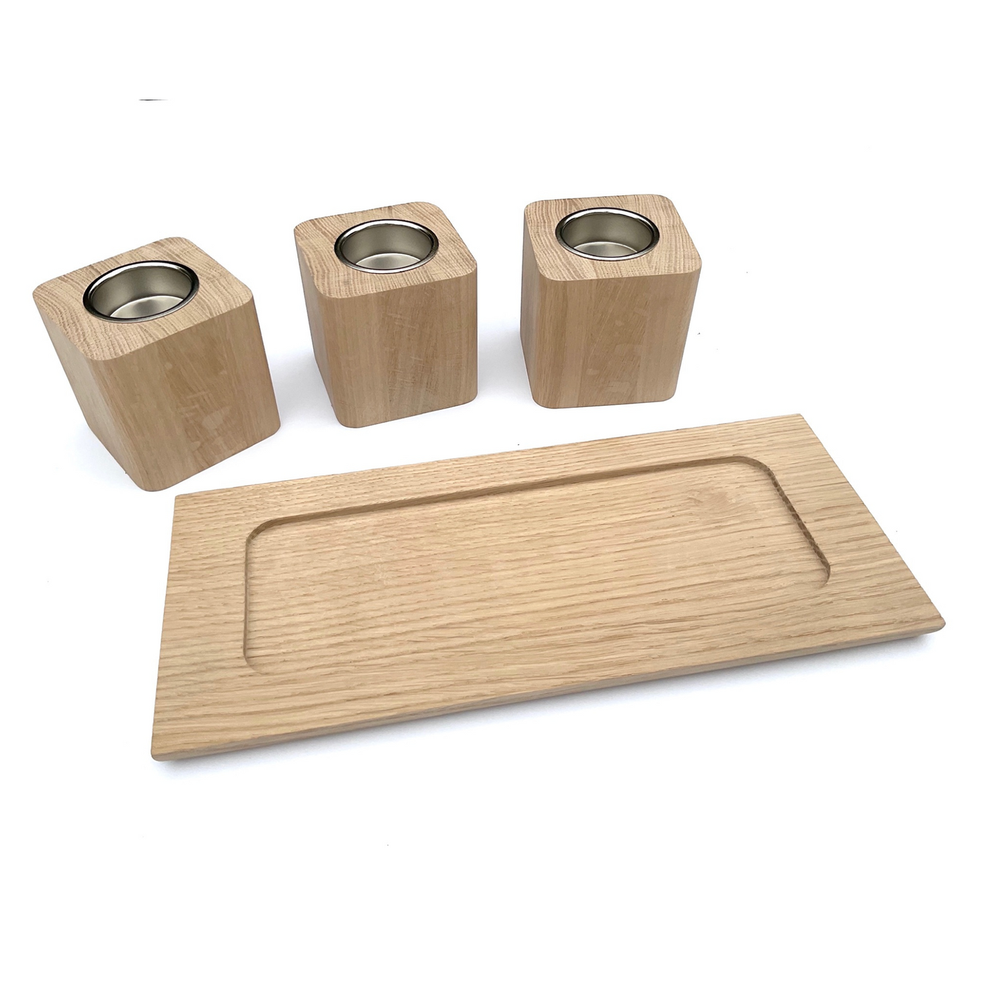 Set of three handmade oak tea light holders with nickel coloured inserts and oak tray