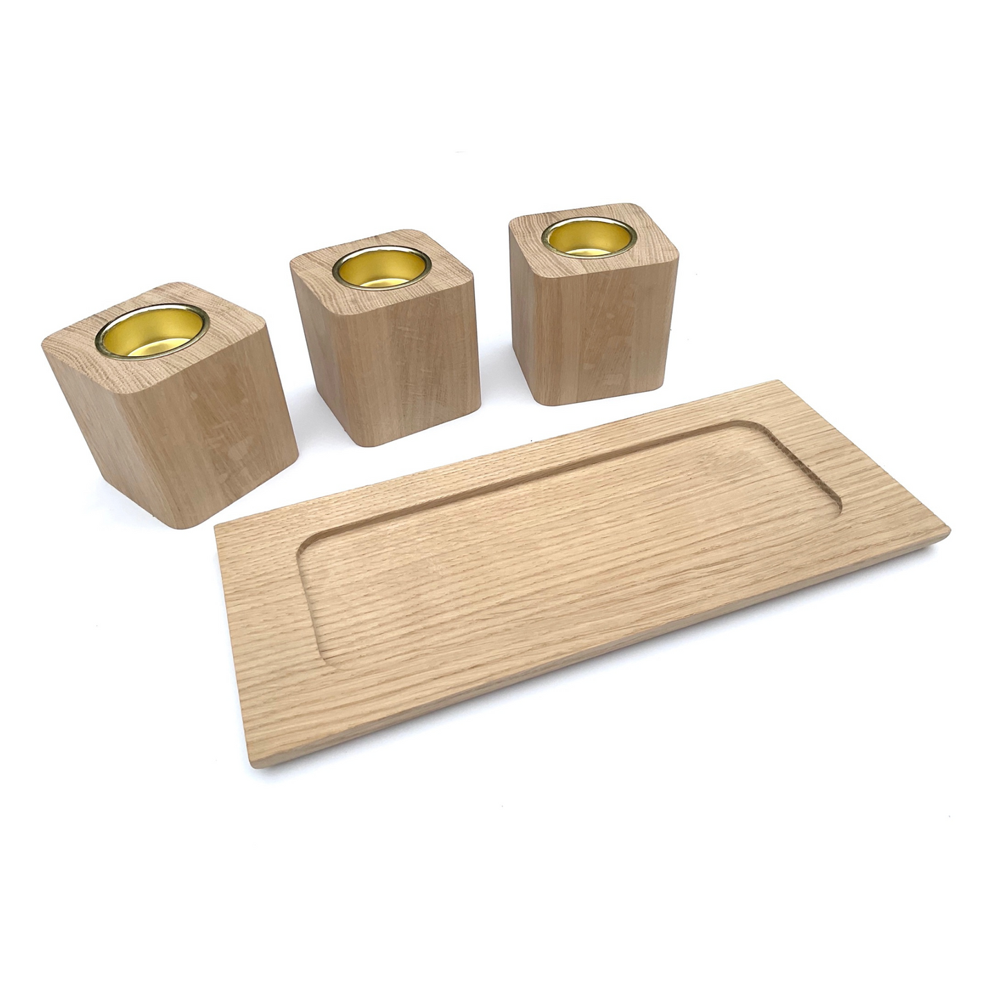 Set of three handmade oak tea light holders with brass coloured inserts and oak tray