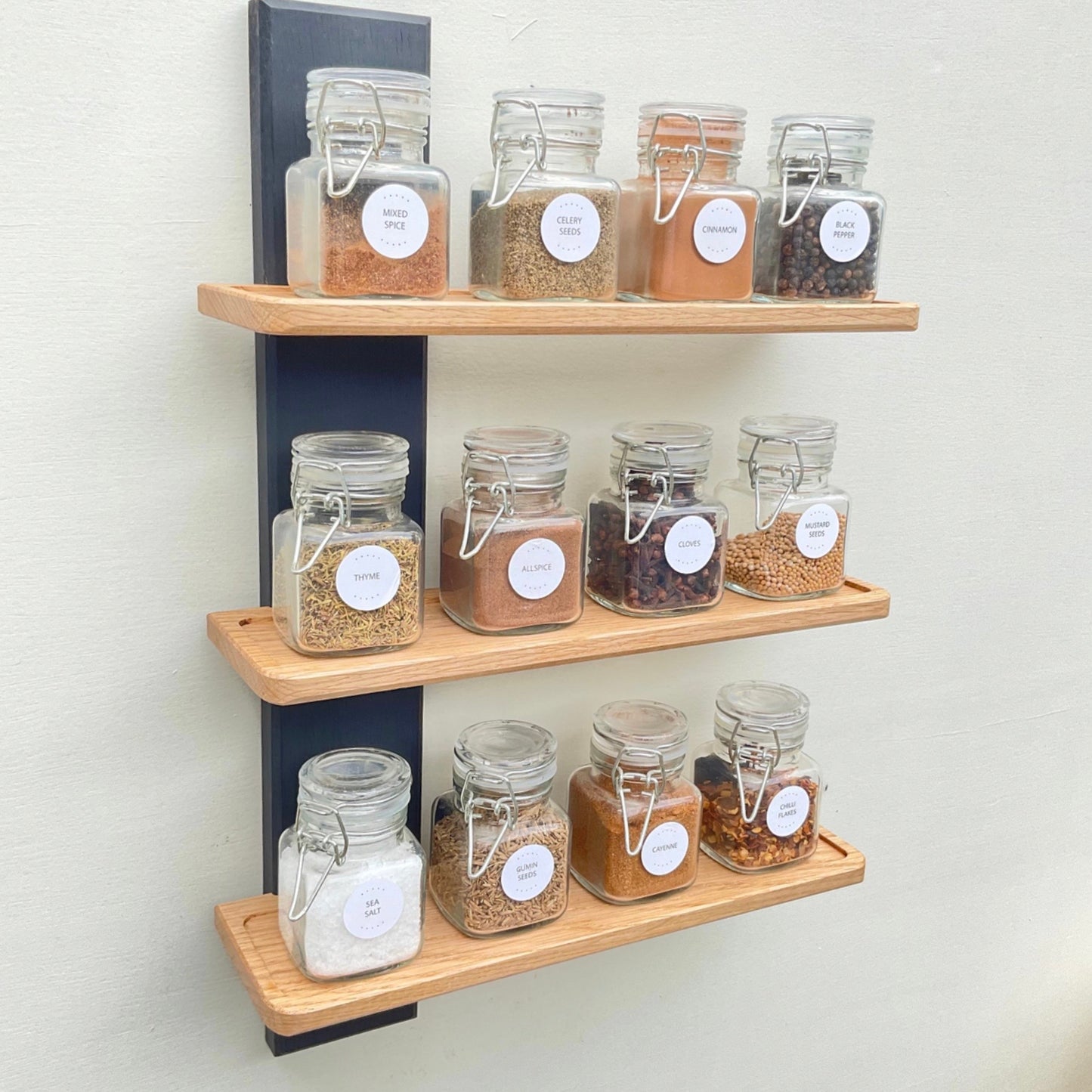 Handmade oak spice rack with jars, wall mounted in black and oak