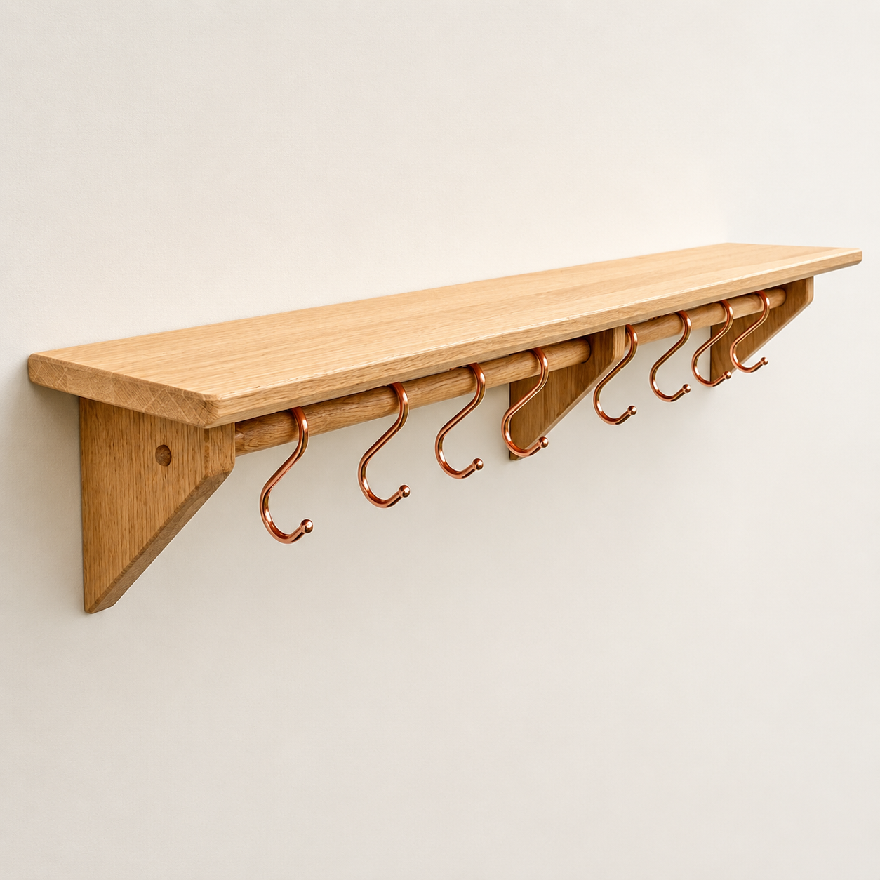 Oak kitchen utensil rail and shelf with copper utensil hooks