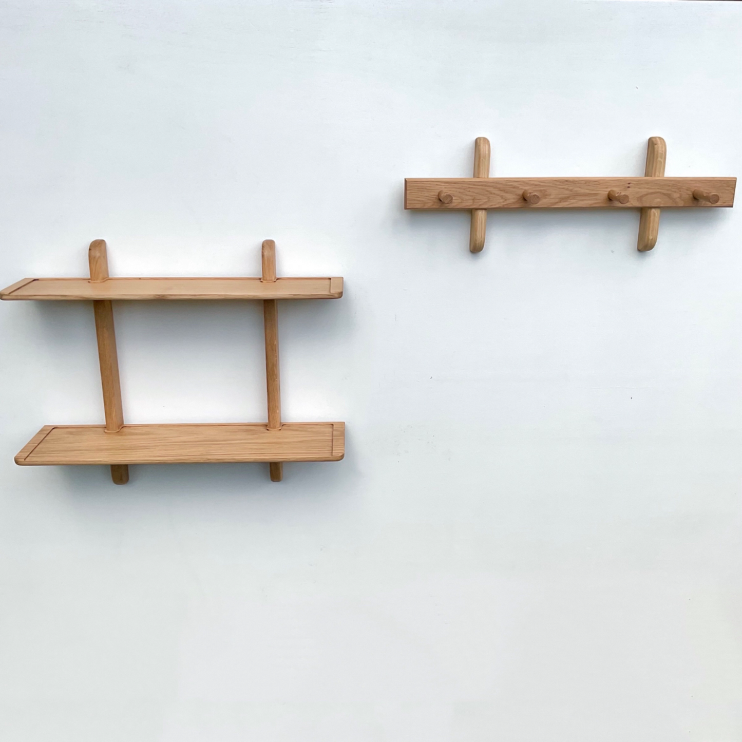 Double oak shelf with matching coat hook, peg rail