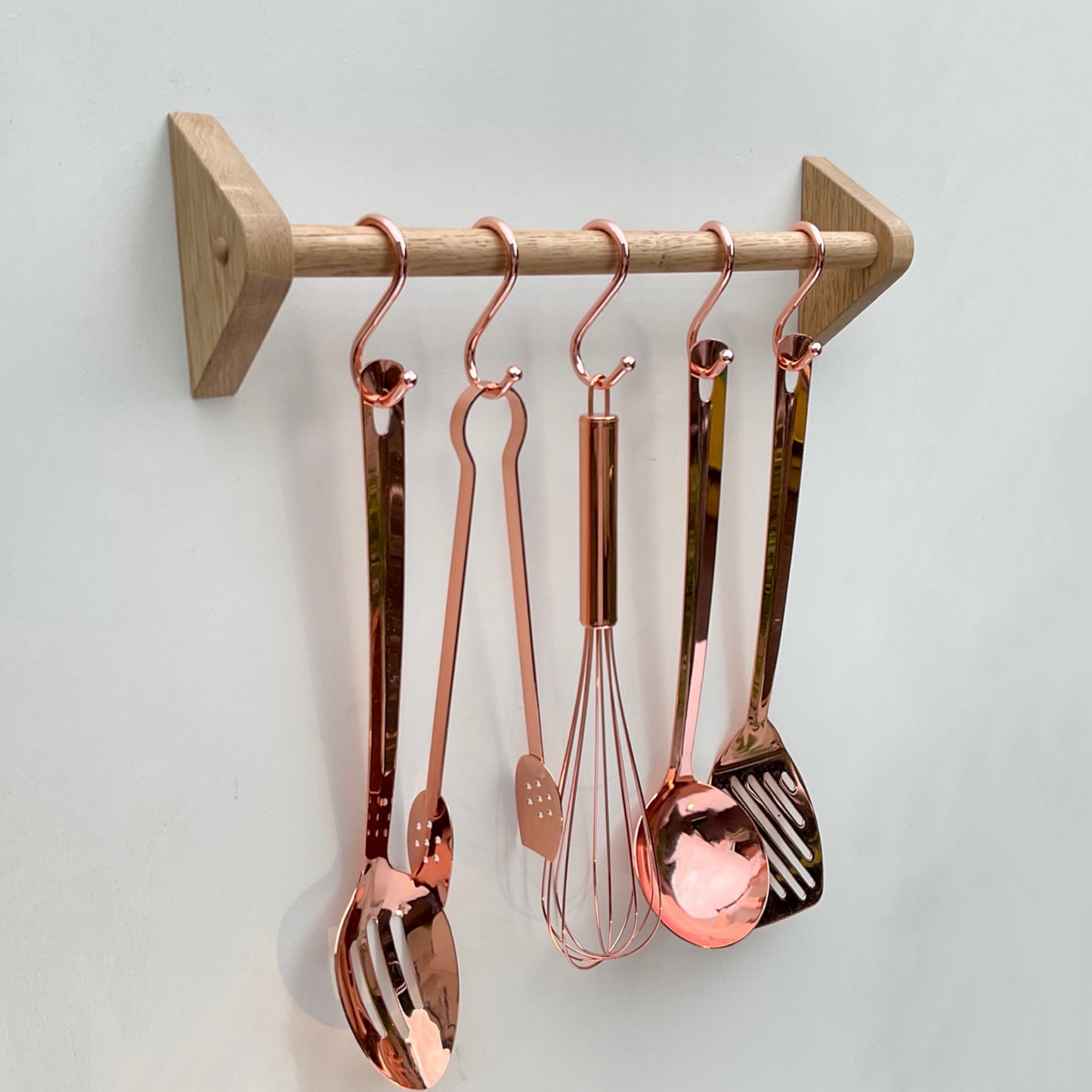 Kitchen utensil rail, wall mounted in oak with copper utensil hooks