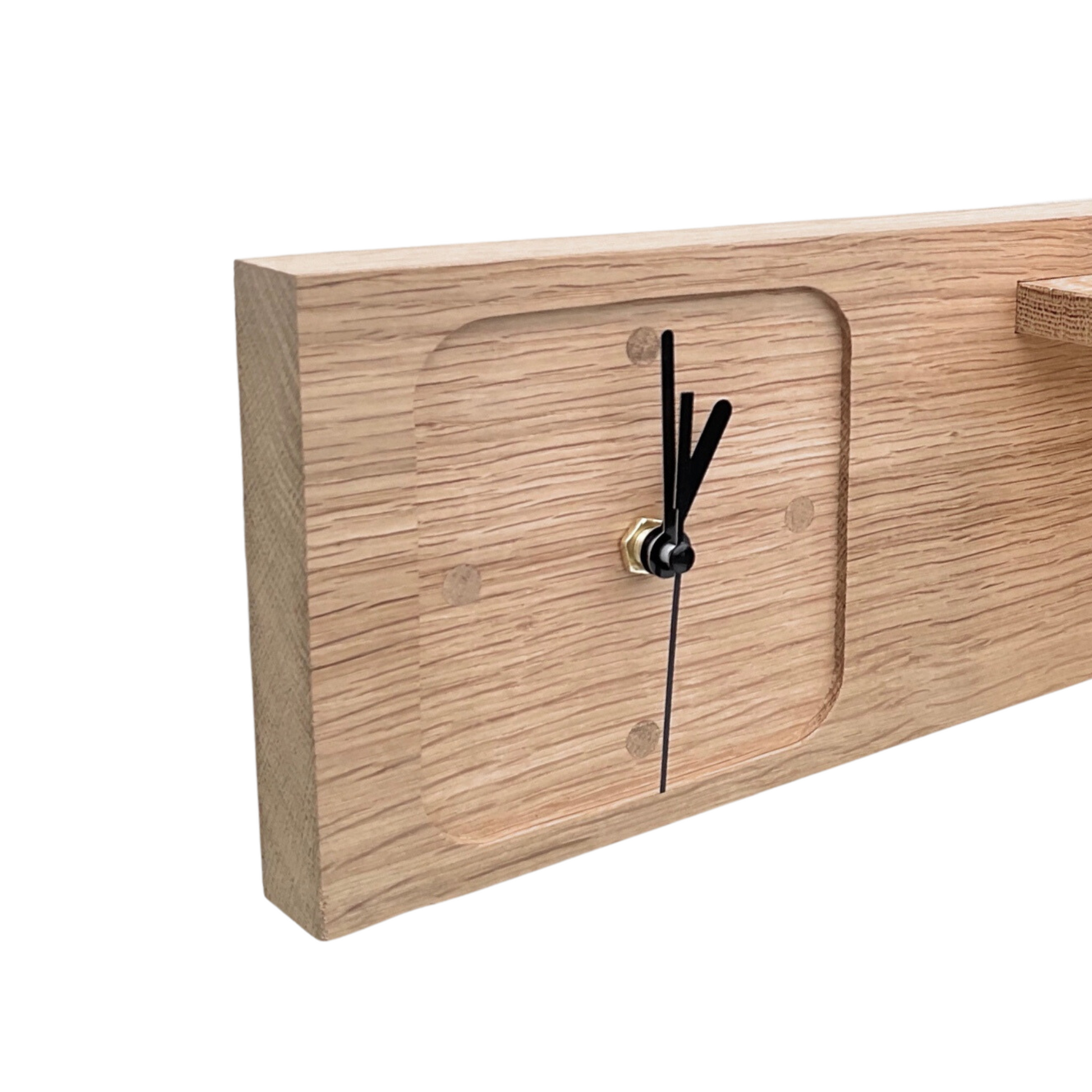 Oak shelf with key pegs and wall clock