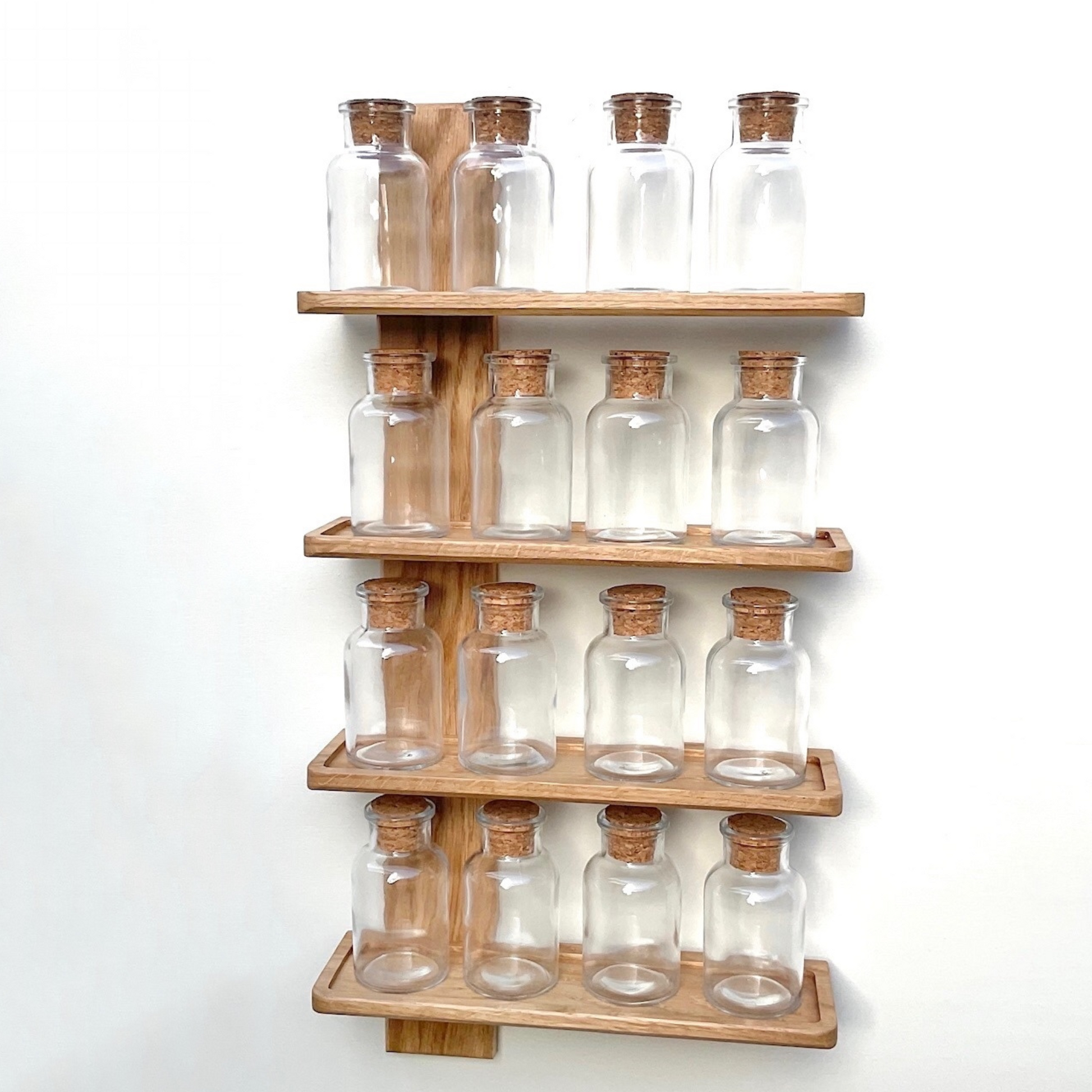 Handmade oak spice rack with round cork top spice jars  