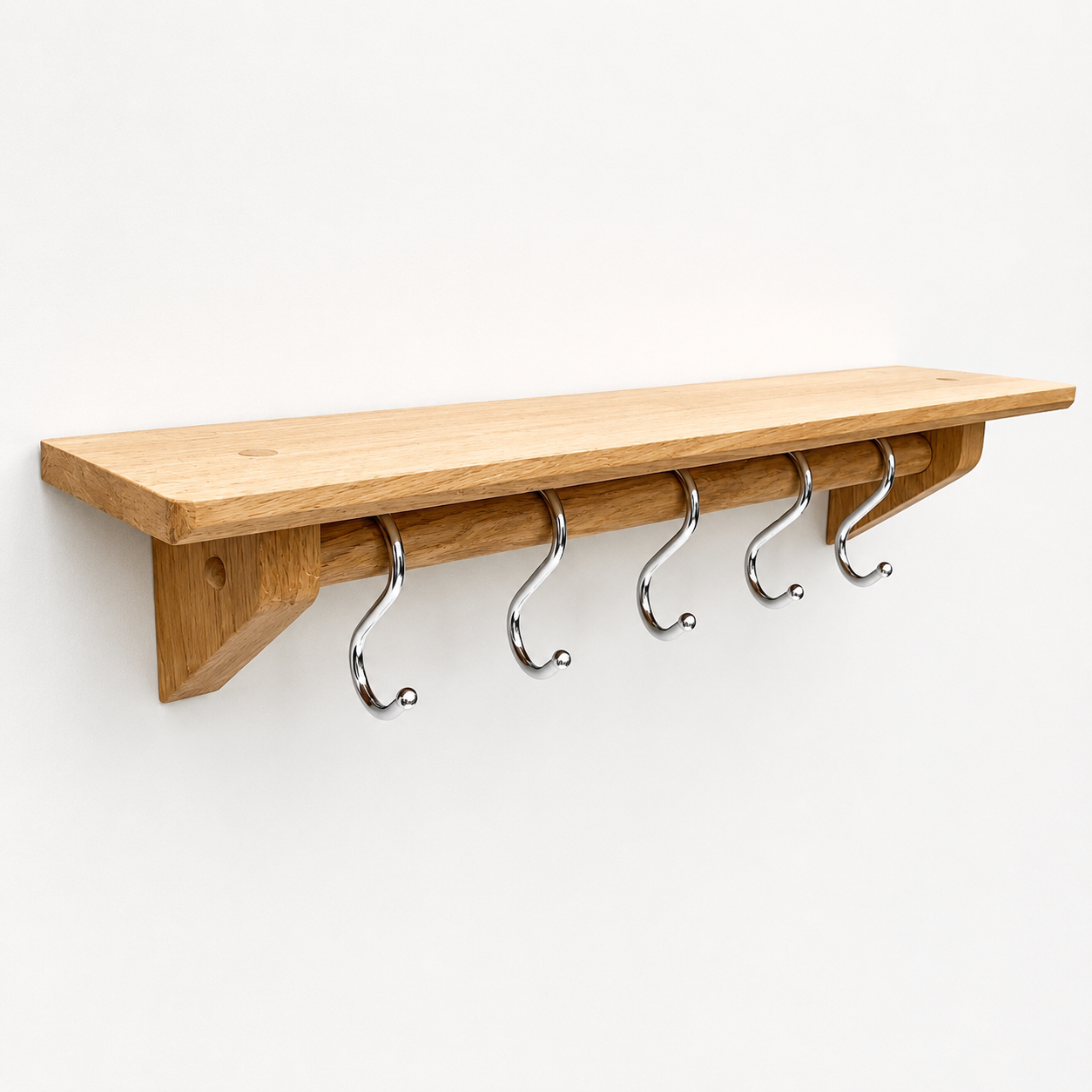 Oak wall mounted kitchen utensil rail with shelf and chrome utensil hooks 