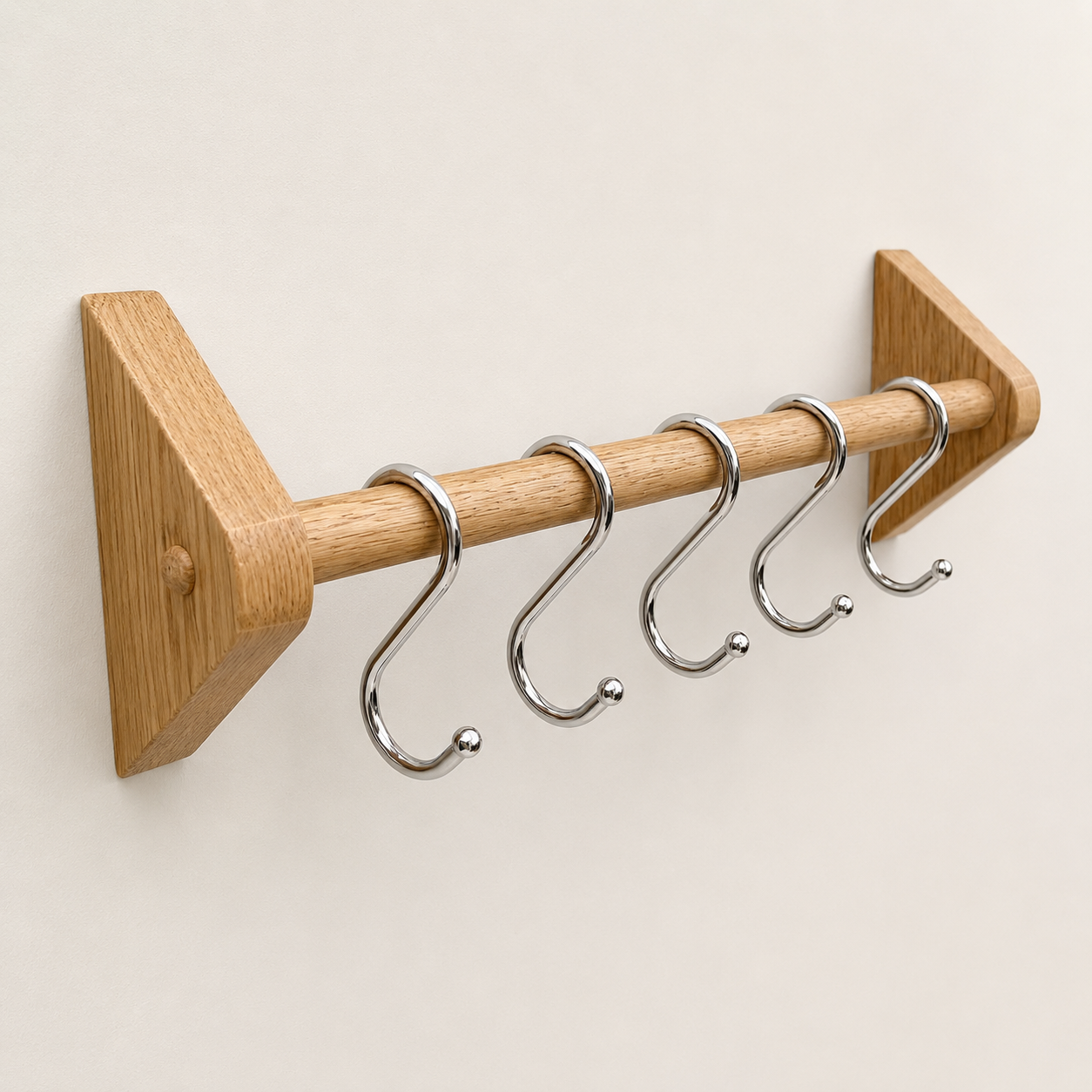 Kitchen utensil rail, wall mounted in oak with chrome utensil hooks