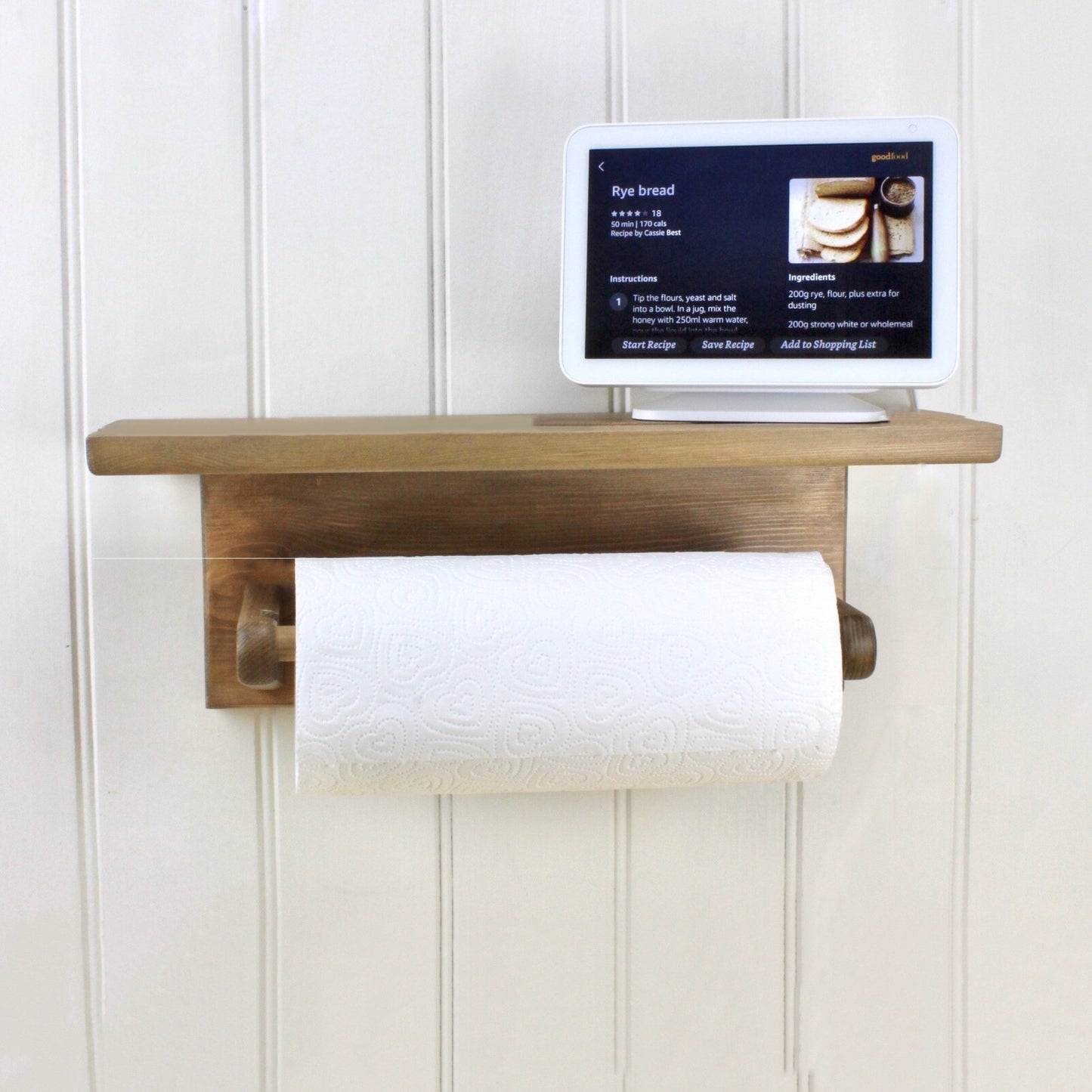 Wall mounted kitchen roll holder with alexa shelf