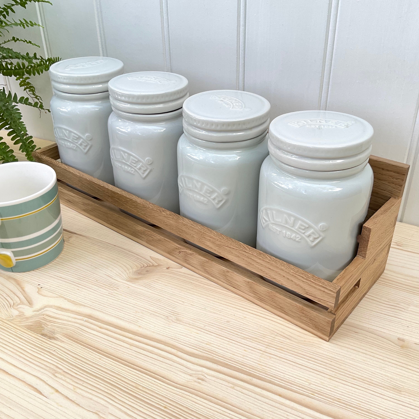 Worktop mounted tea and coffee canister shelf